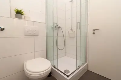 Ein Badezimmer in der Unterkunft Modern, komfortabel, vollausgestattet - Apartments by mevoga