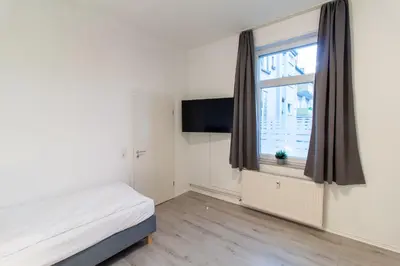 Ein Bett oder Betten in einem Zimmer der Unterkunft Modern, komfortabel, vollausgestattet - Apartments by mevoga