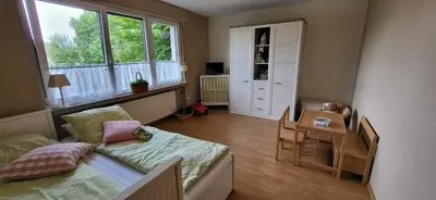 Ein Bett oder Betten in einem Zimmer der Unterkunft Ferienwohnung Hönnetal