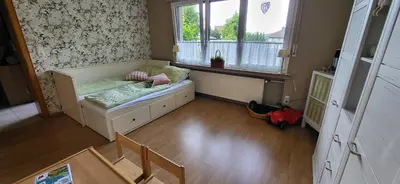 Ein Bett oder Betten in einem Zimmer der Unterkunft Ferienwohnung Hönnetal