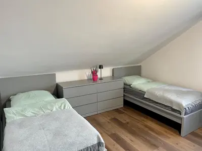 Ein Bett oder Betten in einem Zimmer der Unterkunft B&N Apartment inkl kostenlosen Stellplatz