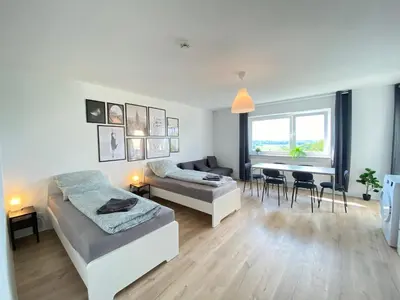 Ein Bett oder Betten in einem Zimmer der Unterkunft Cozy Apartment in Wuppertal