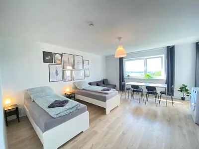 Ein Bett oder Betten in einem Zimmer der Unterkunft Cozy Apartment in Wuppertal