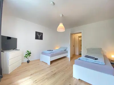 Ein Bett oder Betten in einem Zimmer der Unterkunft Nice Apartment in Wuppertal