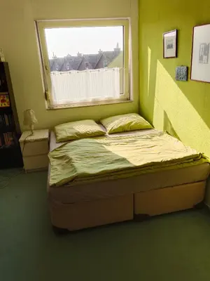 Ein Bett oder Betten in einem Zimmer der Unterkunft Ruhrgebiet