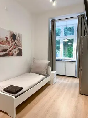Ein Bett oder Betten in einem Zimmer der Unterkunft Apartment mit großer Küche, 4 Personen