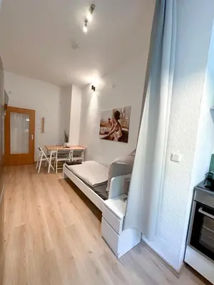 Ein Bett oder Betten in einem Zimmer der Unterkunft Apartment mit großer Küche, 4 Personen