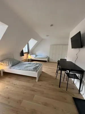 Ein Bett oder Betten in einem Zimmer der Unterkunft RENT SOLUTION - Apartments in Herne - bis zu 10 Personen