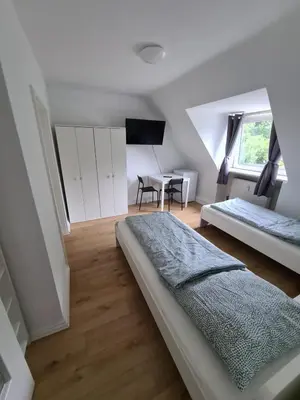 Ein Bett oder Betten in einem Zimmer der Unterkunft RENT SOLUTION - Apartments in Herne - bis zu 10 Personen
