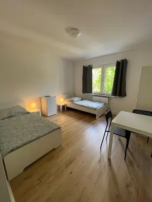 Ein Bett oder Betten in einem Zimmer der Unterkunft RENT SOLUTION - Apartments in Herne - bis zu 10 Personen