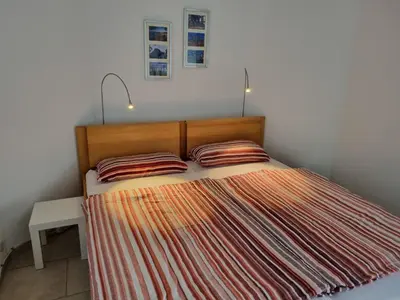 Ein Bett oder Betten in einem Zimmer der Unterkunft DortBlick Appartement