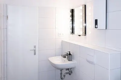 Ein Badezimmer in der Unterkunft Livesto Aparthotel Zentral - 4x moderne 2-Zimmer Apartments 4-5-6 Pers