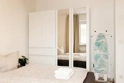 Ein Bett oder Betten in einem Zimmer der Unterkunft Livesto Aparthotel Zentral - 4x moderne 2-Zimmer Apartments 4-5-6 Pers