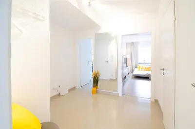 Ein Bett oder Betten in einem Zimmer der Unterkunft Livesto Aparthotel Zentral - 4x moderne 2-Zimmer Apartments 4-5-6 Pers
