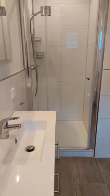 Ein Badezimmer in der Unterkunft Haus Blankenagel