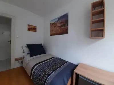 Ein Bett oder Betten in einem Zimmer der Unterkunft Tiny Apartment