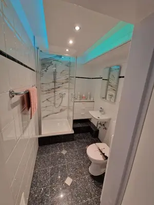 Ein Badezimmer in der Unterkunft Apartment1