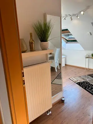 Ein Sitzbereich in der Unterkunft Privatunterkunft Am Aaper Wald
