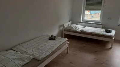 Ein Bett oder Betten in einem Zimmer der Unterkunft Haus Blankenagel
