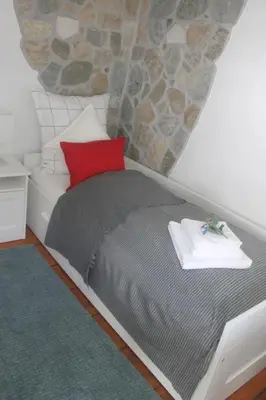 Ein Bett oder Betten in einem Zimmer der Unterkunft Ferienhaus Hof