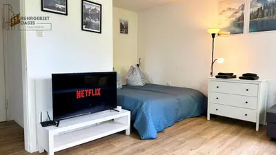 Ein Bett oder Betten in einem Zimmer der Unterkunft Schönes Studioapartment Uni Nähe, WLAN, 4 Gäste