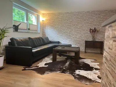 Ein Sitzbereich in der Unterkunft Charmante Souterrain Wohnung