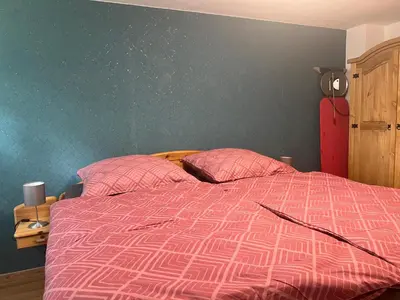 Ein Bett oder Betten in einem Zimmer der Unterkunft Charmante Souterrain Wohnung