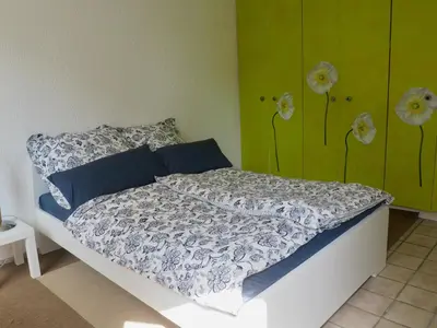 Ein Bett oder Betten in einem Zimmer der Unterkunft Gemütliche Wohnung mit Balkon, verkehrsgünstig gelegen