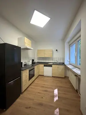Küche/Küchenzeile in der Unterkunft Gemütliche Ferienwohnung - voll ausgestattet, zentral aber ruhig !