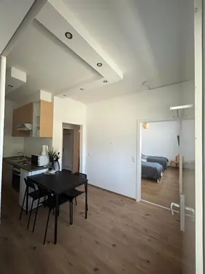 Ein Bett oder Betten in einem Zimmer der Unterkunft Gemütliche Ferienwohnung - voll ausgestattet, zentral aber ruhig !