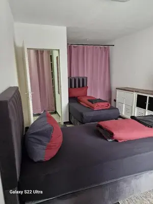 Ein Bett oder Betten in einem Zimmer der Unterkunft Apartment am Konzerthaus