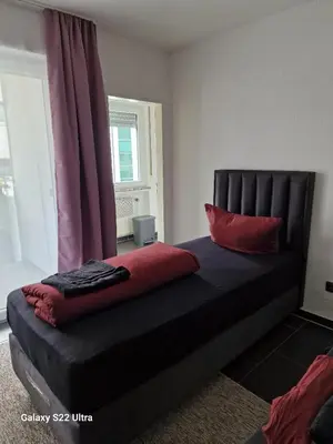 Ein Bett oder Betten in einem Zimmer der Unterkunft Apartment am Konzerthaus