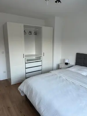 Ein Bett oder Betten in einem Zimmer der Unterkunft Thê Rath Residence