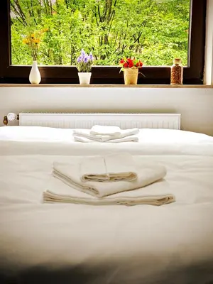 Ein Bett oder Betten in einem Zimmer der Unterkunft Jakz Hotel