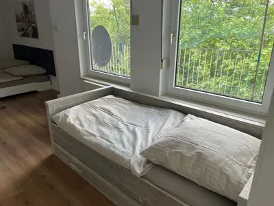 Ein Bett oder Betten in einem Zimmer der Unterkunft Schöne und sehr zentrale Wohnung im Herzen von Gelsenkirchen
