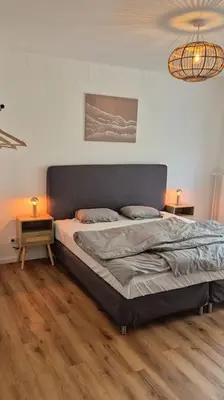 Ein Bett oder Betten in einem Zimmer der Unterkunft Stilvoll im Herzen Bochums