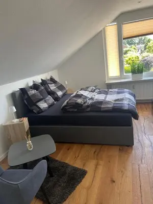 Ein Bett oder Betten in einem Zimmer der Unterkunft Harkort Seeblick 2