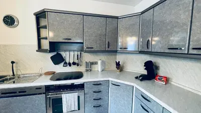 Küche/Küchenzeile in der Unterkunft GNA01 - Große Wohnung mit 7 Betten, große Küche, 2 Balkone & Parkplatz