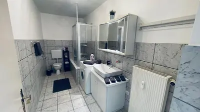 Ein Badezimmer in der Unterkunft GNA01 - Große Wohnung mit 7 Betten, große Küche, 2 Balkone & Parkplatz
