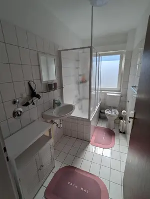Ein Badezimmer in der Unterkunft SK Apartments - Schalke