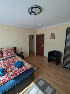 Ein Bett oder Betten in einem Zimmer der Unterkunft SK Apartments - Schalke