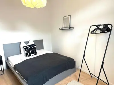 Ein Bett oder Betten in einem Zimmer der Unterkunft WohnTRAUM 140qm - 10 Personen - City - Nähe DUS & Dortmund & Köln & Essen
