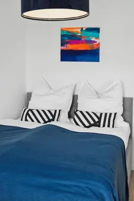 Ein Bett oder Betten in einem Zimmer der Unterkunft Stylisches Apartment, Parkplatz, Nähe DUS & Dortmund & Köln & Essen