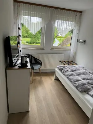 Ein Bett oder Betten in einem Zimmer der Unterkunft Hotel Zur Mühle