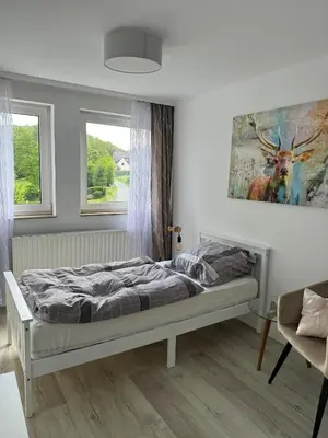 Ein Bett oder Betten in einem Zimmer der Unterkunft Hotel Zur Mühle