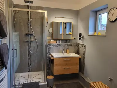 Ein Badezimmer in der Unterkunft Ferienwohnung am Rathenauplatz