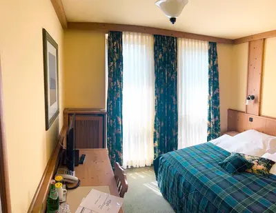 Ein Bett oder Betten in einem Zimmer der Unterkunft Hotel Albers