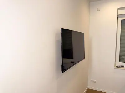 TV/Unterhaltungsangebot in der Unterkunft Ruhr Business Apartments Essen Apartment mit 5 Einzelbetten Privat Parkplatz