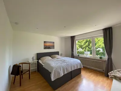 Ein Bett oder Betten in einem Zimmer der Unterkunft Stilvolles Domizil im Zentrum von Unna