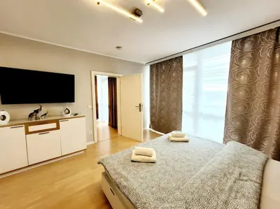 Ein Bett oder Betten in einem Zimmer der Unterkunft 2- Zimmer, 4Pers, direkt neben Einkaufszentrum, Hbf